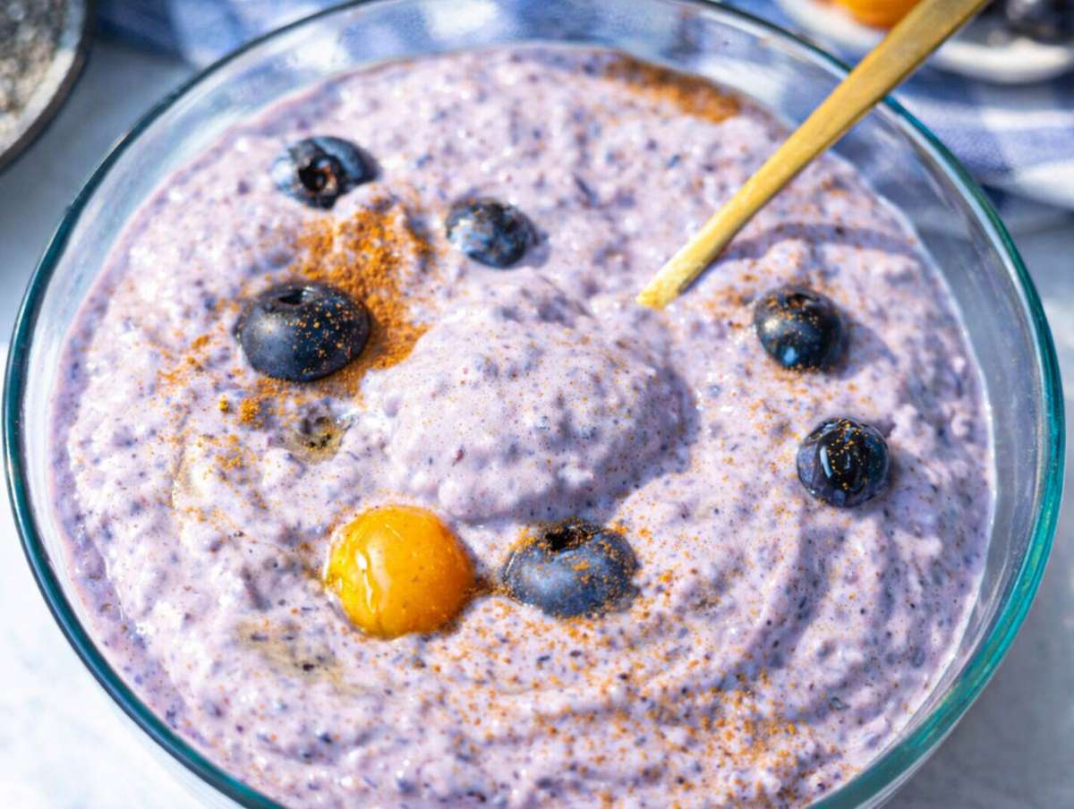 Step 3 Creamy blueberry chia pudding with Greek yogurt served for breakfast in a glass bowl