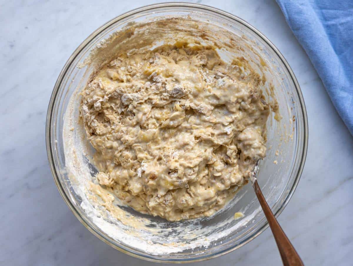 Step 3 Dry ingredients added to wet batter with oats and flour visible.
