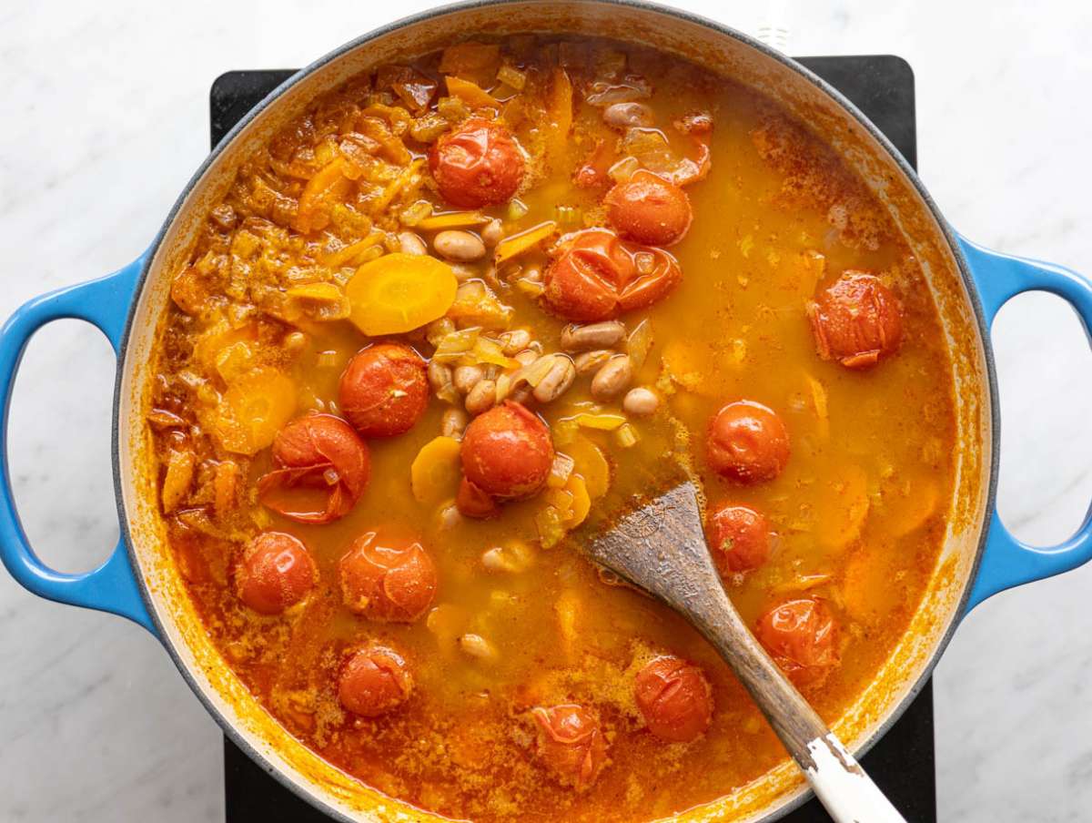 Step 3 Pinto beans and broth simmering gently in the pot.