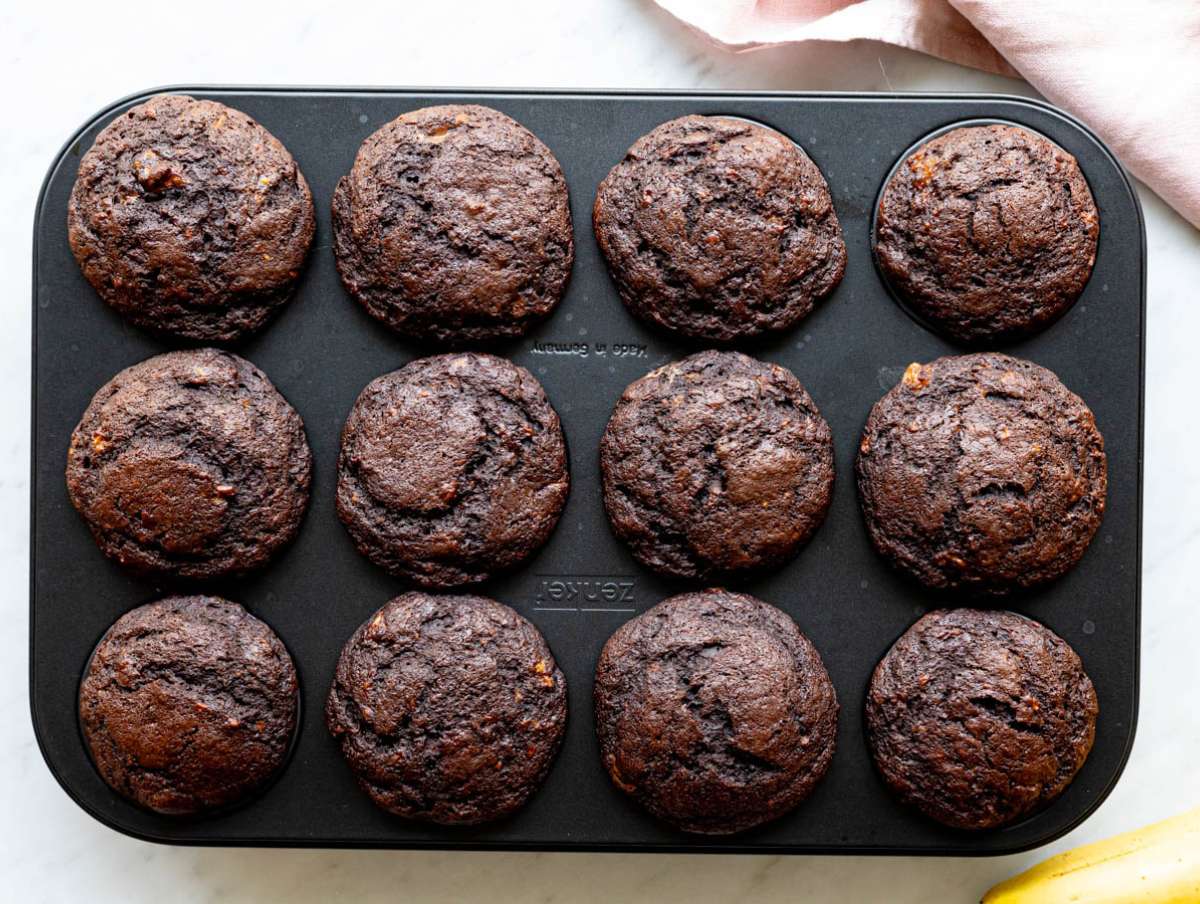 Step 4 Bakes banana chocolate muffins cooling down in muffin pan.