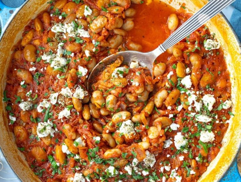 Step 4 Finished beans topped with crumbled feta parsley and olive oil.