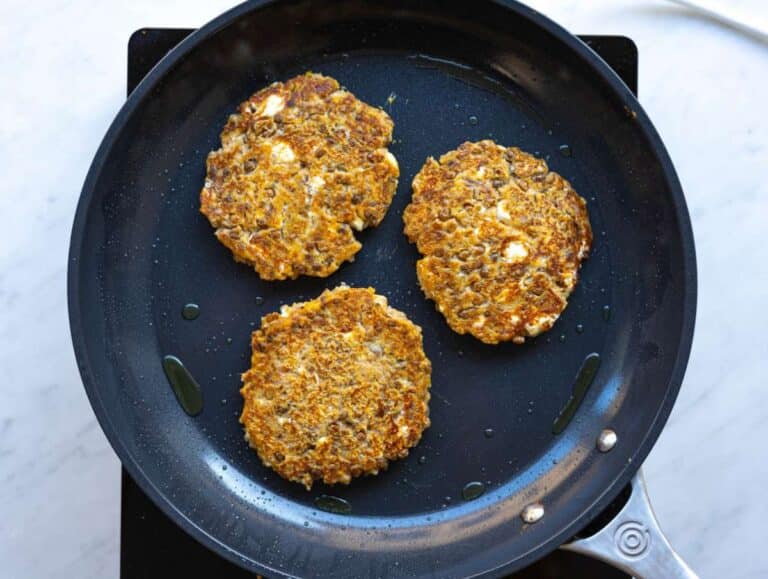Step 4 Patties cooking in nonstick skillet turning golden on first side.