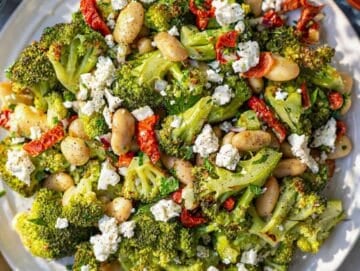Step 4 Roasted broccoli mixed with beans, herbs, and dressing just before serving.