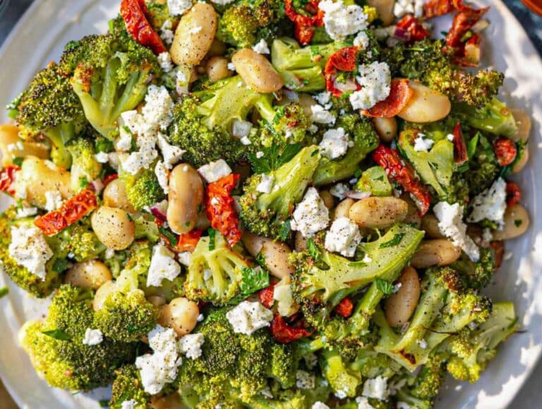 Step 4 Roasted broccoli mixed with beans, herbs, and dressing just before serving.