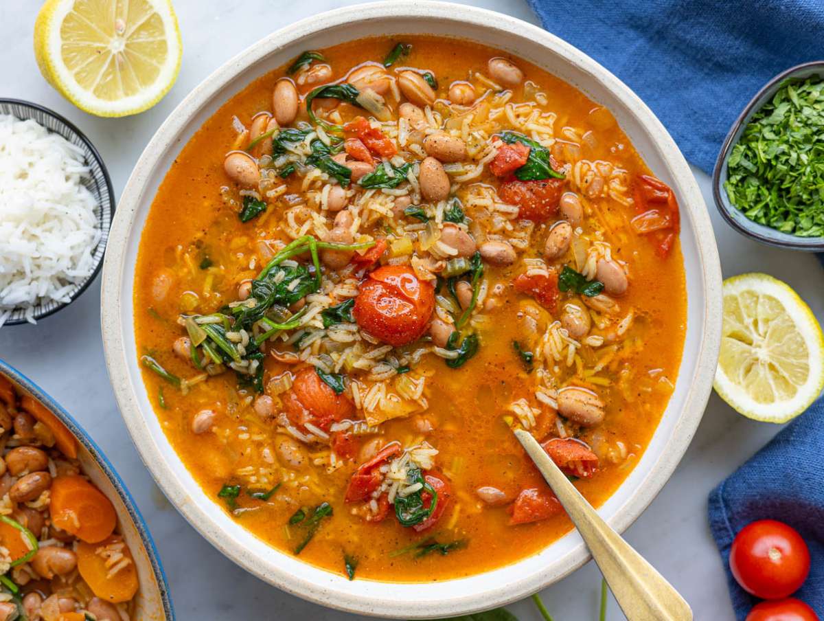 Step 5 Finished soup being ladled into bowls and topped with olive oil and black pepper.