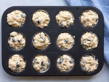 Step 5 Muffin batter scooped into lined muffin pan filled to the top.