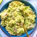 Creamy chickpea avocado salad served in a bowl as a dip for a night with friends.
