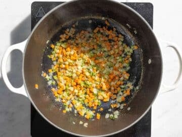 Step 1 Chopped onion carrot and celery cooking in olive oil.