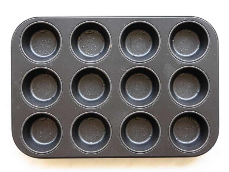 Step 1 Greased 12 cup muffin pan on table