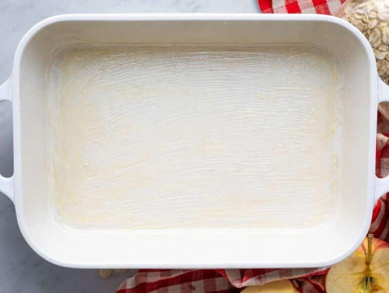 Step 1 Greased baking dish on a table.