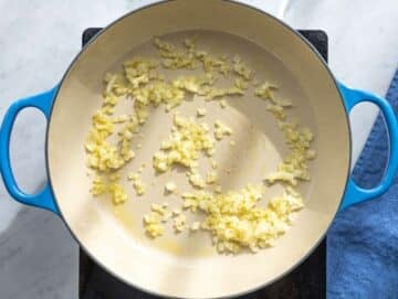 Step 1 Olive oil and chopped onion cooking gently in a large skillet.