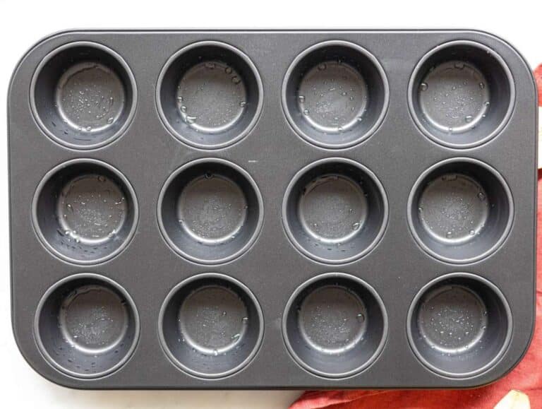 Step 1 twelve-cup muffin pan sprayed with oil.