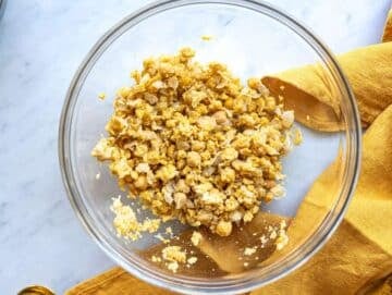 Step 2 Chickpeas mashed with fork in large mixing bowl.