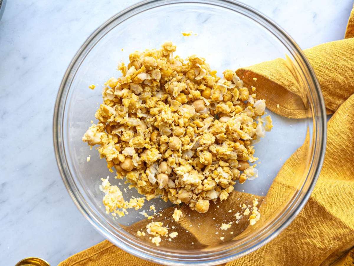 Step 2 Chickpeas mashed with fork in large mixing bowl.