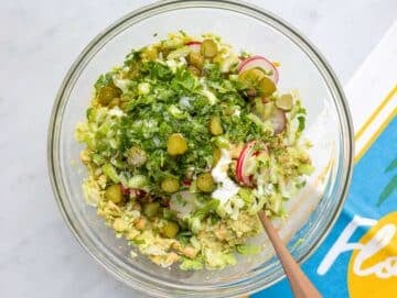 Step 2 Chopped vegetables and yogurt about to be mixed into mashed chickpea and avocado.