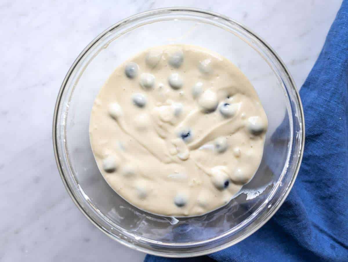 Step 2 Dry ingredients and blueberries folded into thick pancake batter.