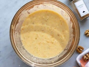 Step 2 Greek yogurt egg honey and vanilla whisked together with mashed bananas.