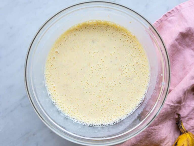 Step 2 Greek yogurt, milk, honey, vanilla, and egg whisked into banana mixture.