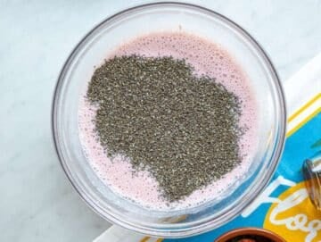 Step 2 Whisking chia seeds into strawberry yogurt mixture until evenly combined.