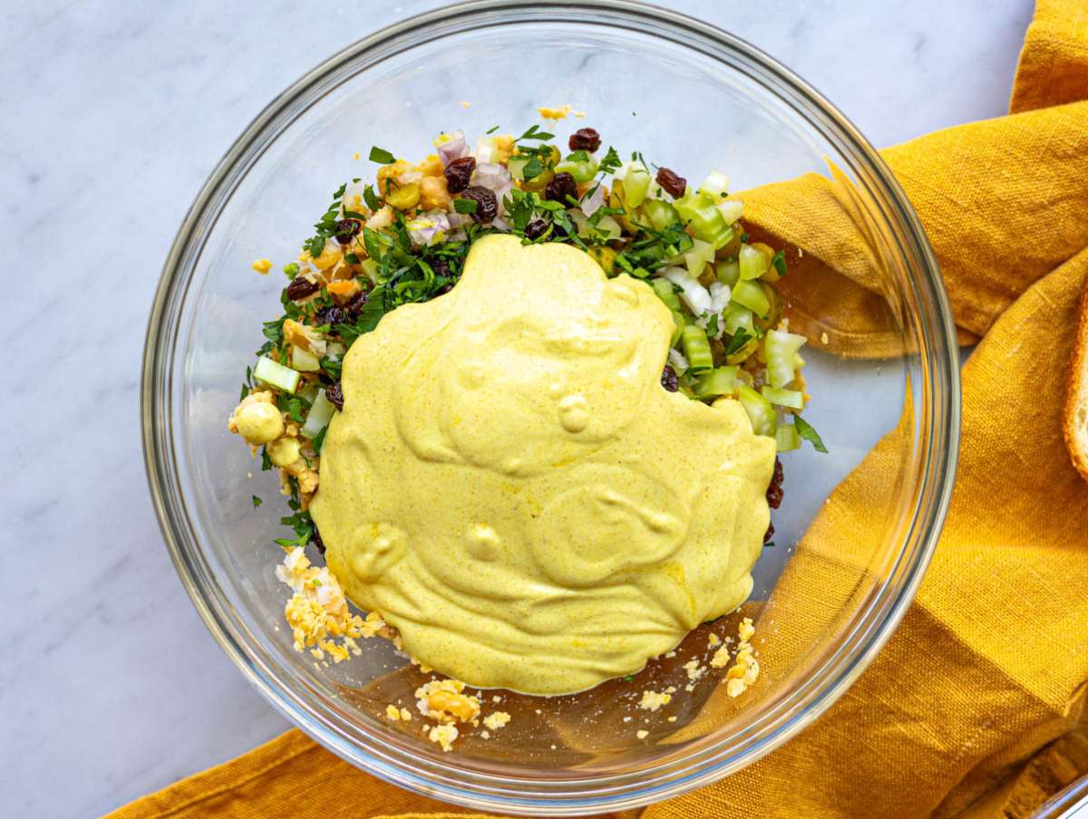 Step 3 Chopped pickles, celery, and onion added to mashed chickpeas with dressing.