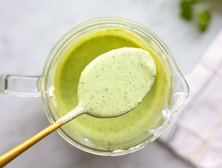 Step 3 Creamy green yogurt dressing blended in tall container.