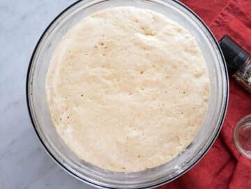 Step 3 Focaccia dough risen and doubled in size in the bowl.