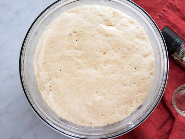 Step 3 Focaccia dough risen and doubled in size in the bowl.