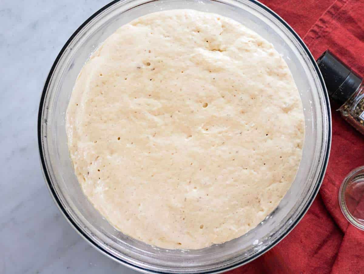 Step 3 Focaccia dough risen and doubled in size in the bowl.