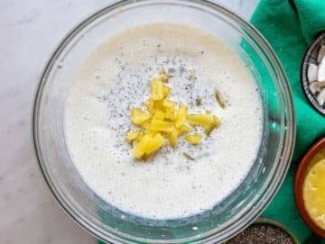 Step 3 Folding chopped pineapple into chia pudding base.