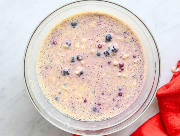 Step 3 Oat mixture with frozen mixed berries folded into batter.