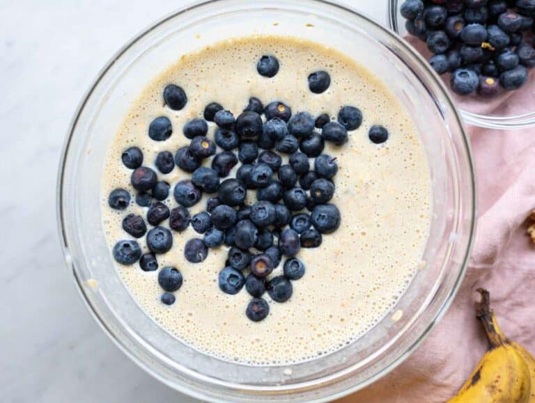 Step 3 Oats and blueberries folded into creamy batter in mixing bowl.