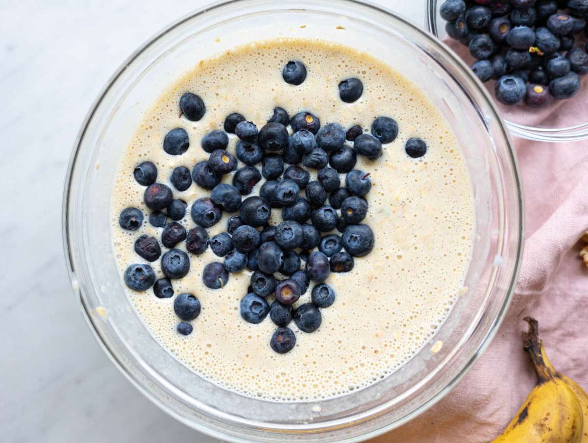 Step 3 Oats and blueberries folded into creamy batter in mixing bowl.