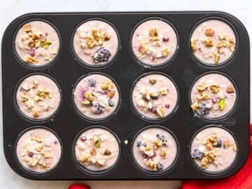 Step 4 Batter spooned evenly into greased muffin pan wells.