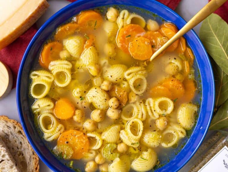 Step 4 Finished soup served in bowls with parsley and Parmesan on top.