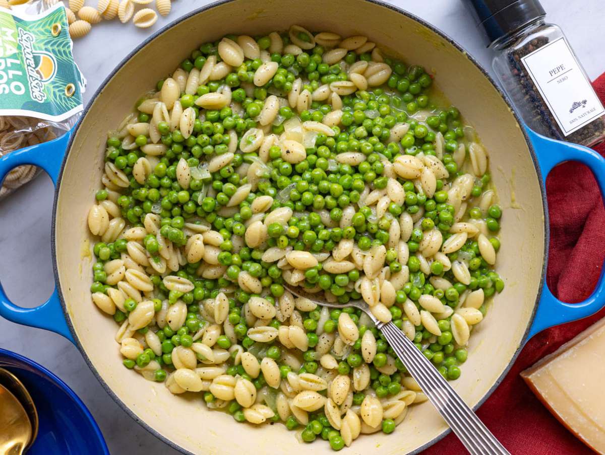 Step 4 Grated Parmesan stirred into pasta off the heat until glossy.