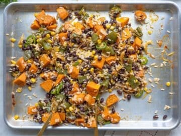 Step 4 Rice, beans, and corn tossed with roasted vegetables on hot tray.