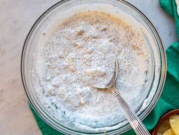 Step 4 Spoon stirring thick pineapple chia pudding before serving.