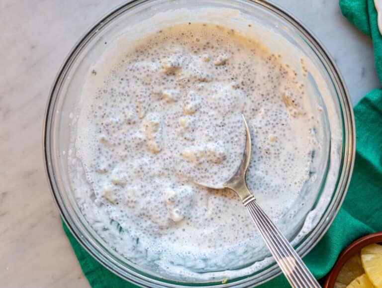 Step 4 Spoon stirring thick pineapple chia pudding before serving.