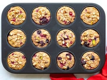 Step 5 Baked oatmeal cups cooling in muffin pan after baking.