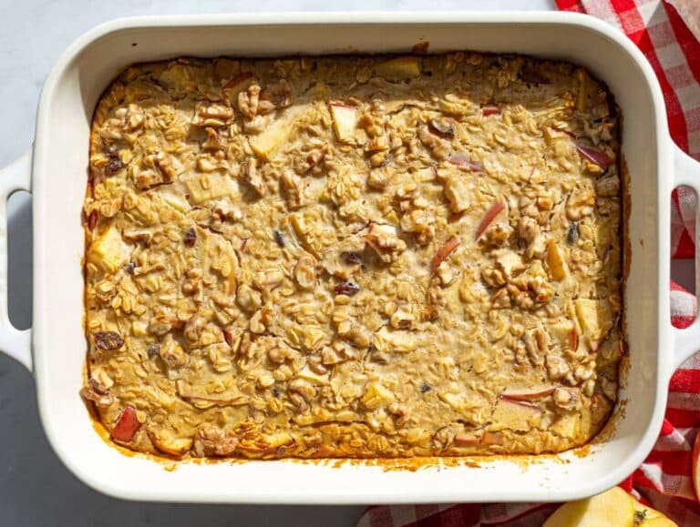 Step 6 Golden baked apple oatmeal cooling in square baking pan.