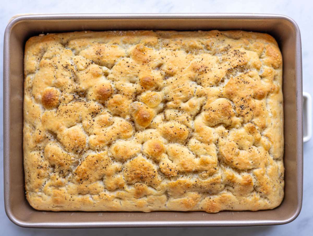 Step 7 Black pepper focaccia baked in the oven until golden and puffed.
