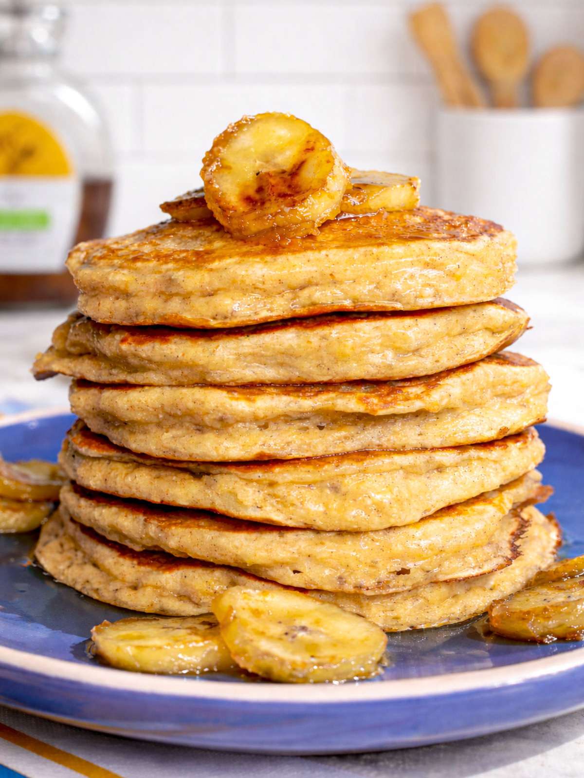 Close-up of soft banana oatmeal pancakes showing golden edges.