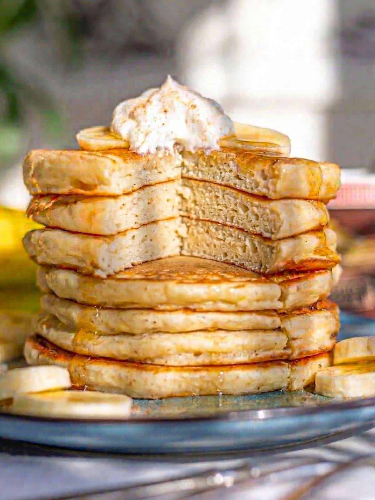 Close up of soft fluffy pancake interior with banana and yogurt texture visible.