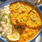 Greek yogurt lentil curry topped with a squeeze of fresh lemon.