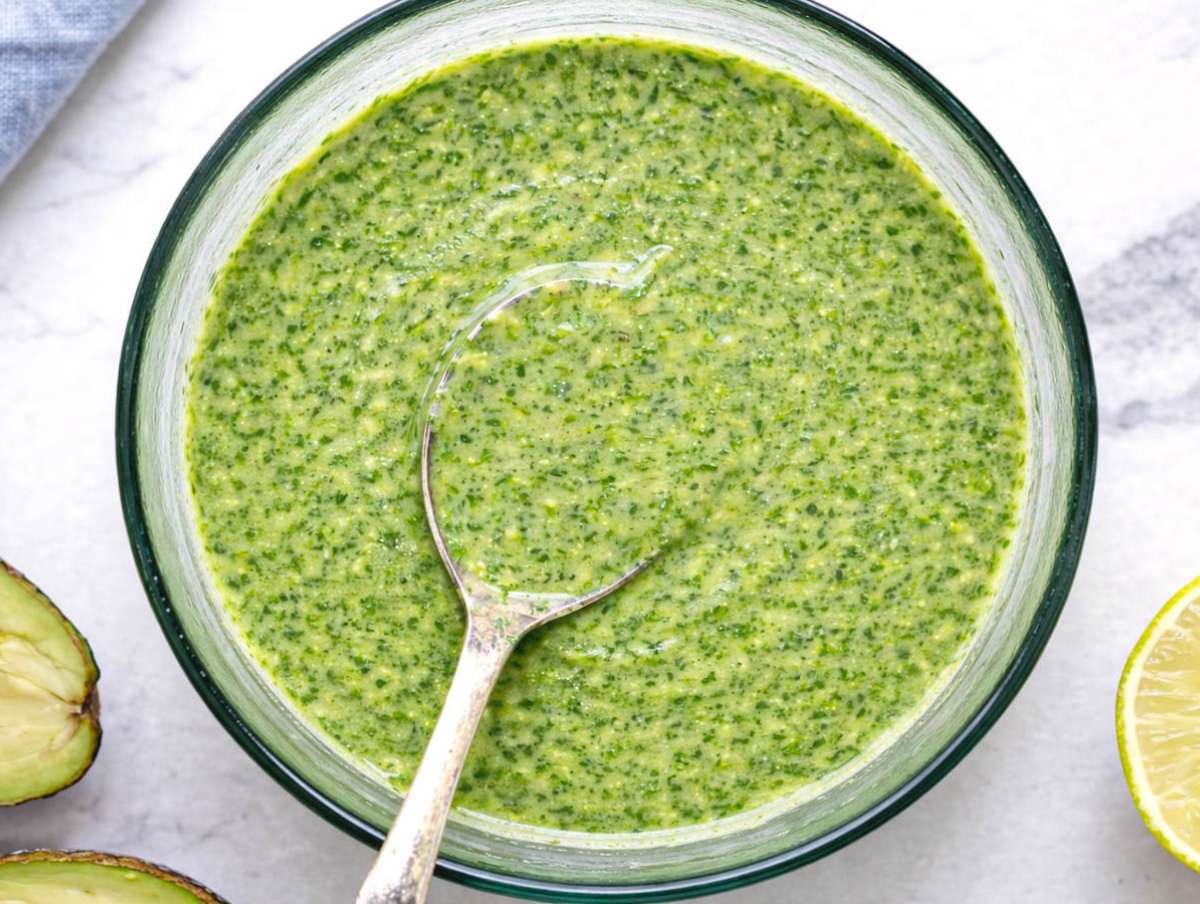 Step 1 Cilantro lime dressing blended in small blender jar with herbs visible.