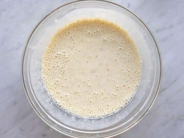 Step 1 Greek yogurt, milk, honey, and egg whisked with mashed banana in mixing bowl.
