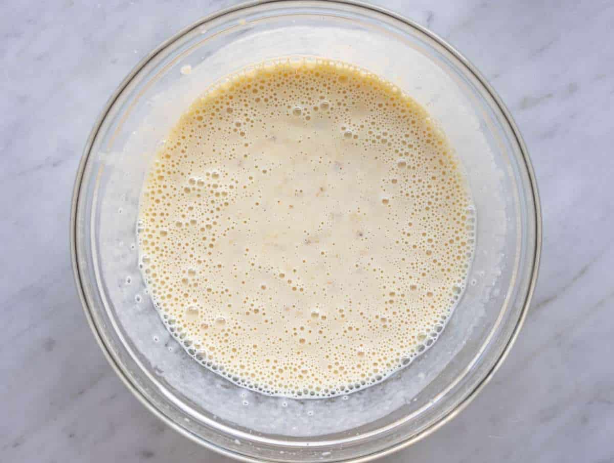 Step 1 Greek yogurt, milk, honey, and egg whisked with mashed banana in mixing bowl.