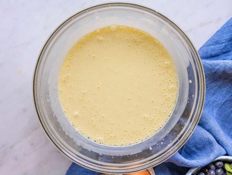 Step 1 Whisking Greek yogurt, milk, egg, and lemon zest in bowl until smooth.