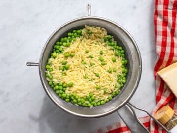 Step 2 Cooked orzo and peas drained in a colander.