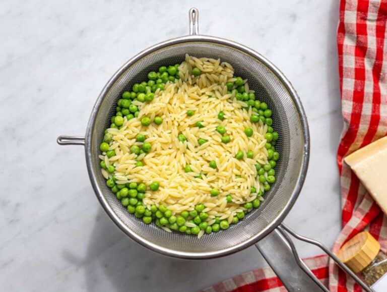 Step 2 Cooked orzo and peas drained in a colander.